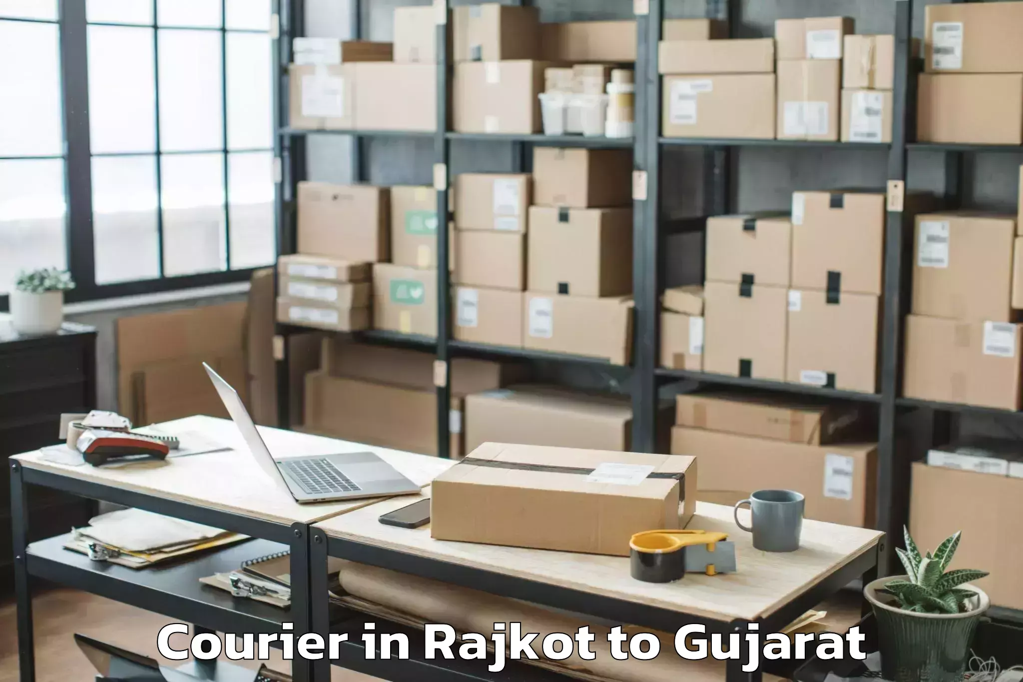 Top Rajkot to Vaghodia Ina Courier Available